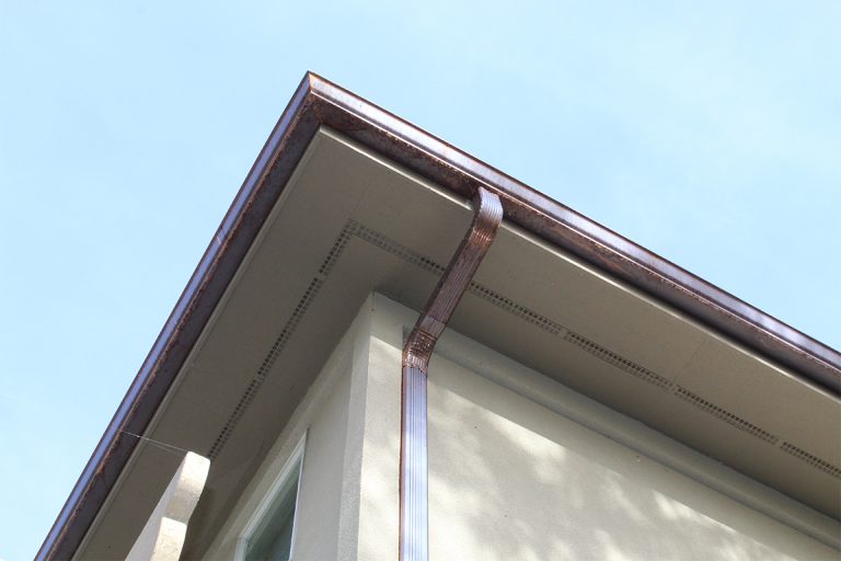 Copper gutter and downspout